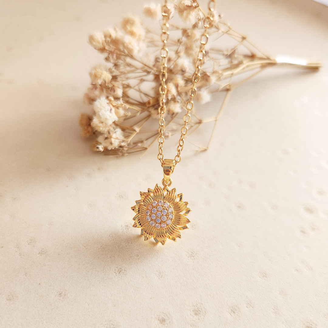 Collar Girasol Giratorio Gold - Colección Acero