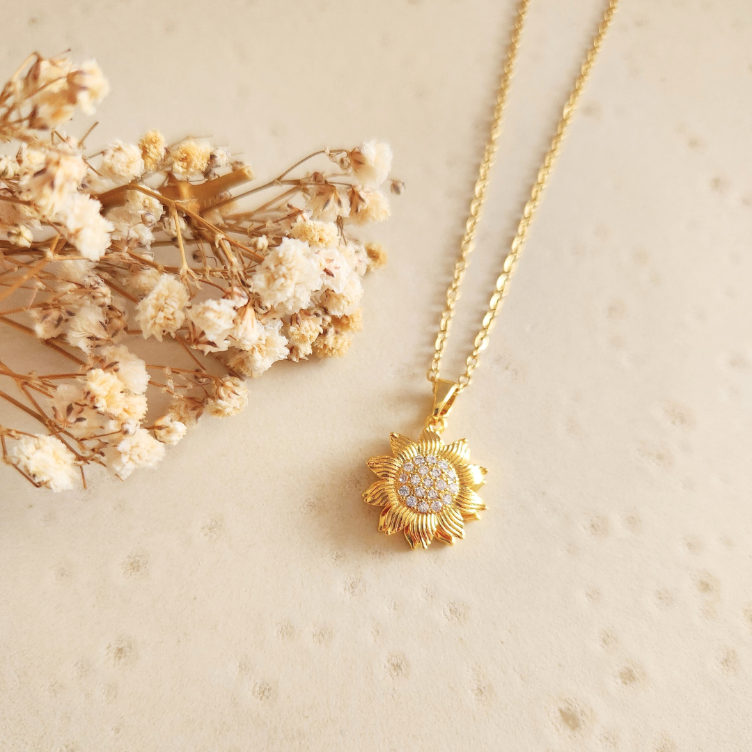 Collar Girasol Giratorio Gold - Colección Acero