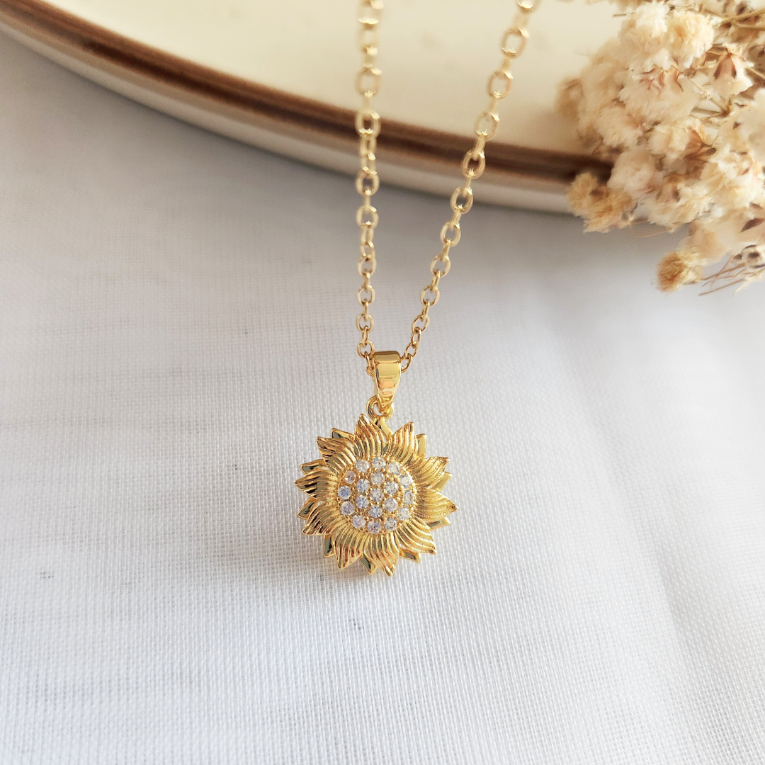 Collar Girasol Giratorio Gold - Colección Acero